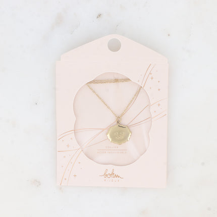 Collier - pendentif tête de chiot souriante