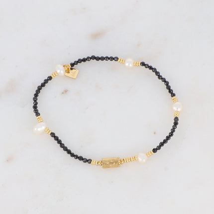 Bracelet on wire with tree bark pattern and natural stones
