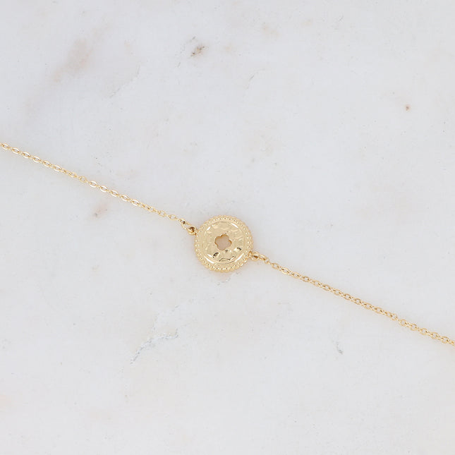 Bracelet avec pendentif martelé avec trèfle ajouré