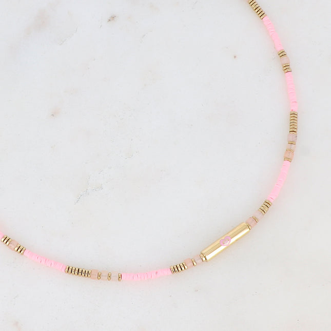 Collier avec cylindre et forme (coeur, trèfle, oeil) en émail
