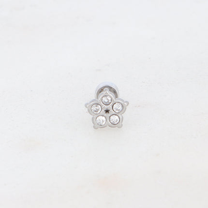 Piercing avec fleur et oxydes de zirconium