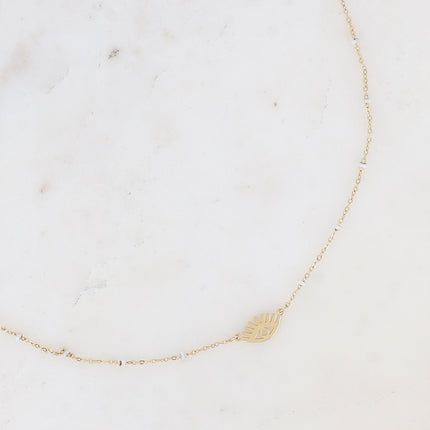 Collier - touches en émail et pendentif oeil ajouré
