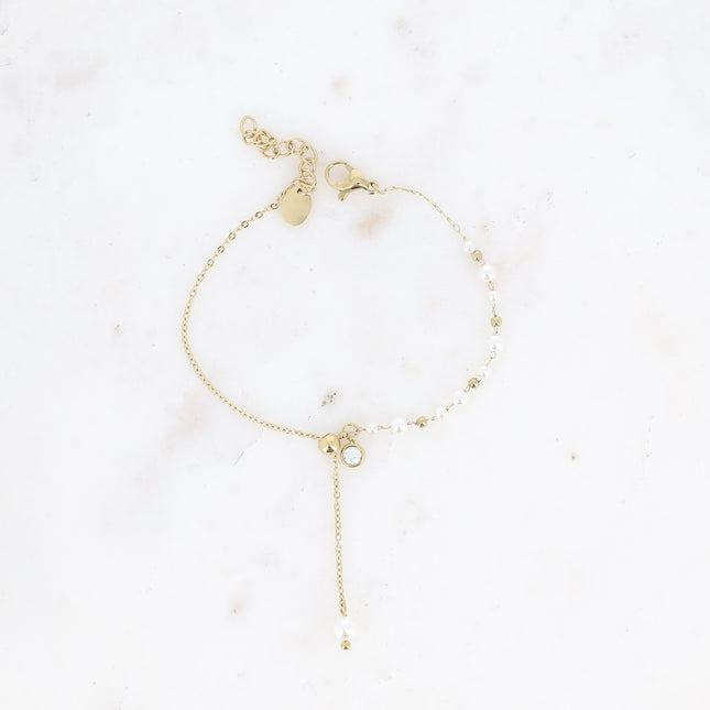 Bracelet Teodora - boule coulissante, perles de résine blanche et cristal taillé