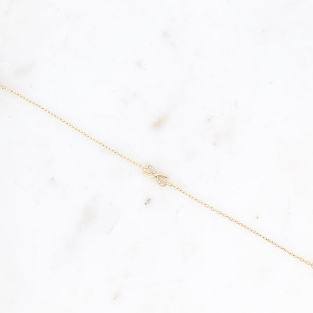 Infinity symbol bracelet with cubic zirconia