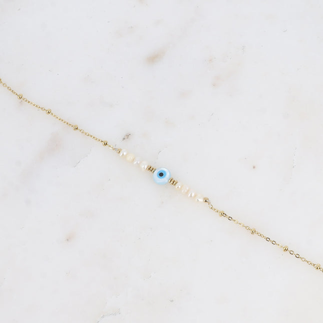 Bracelet Flavia - perles d'eau douce, pendentif oeil