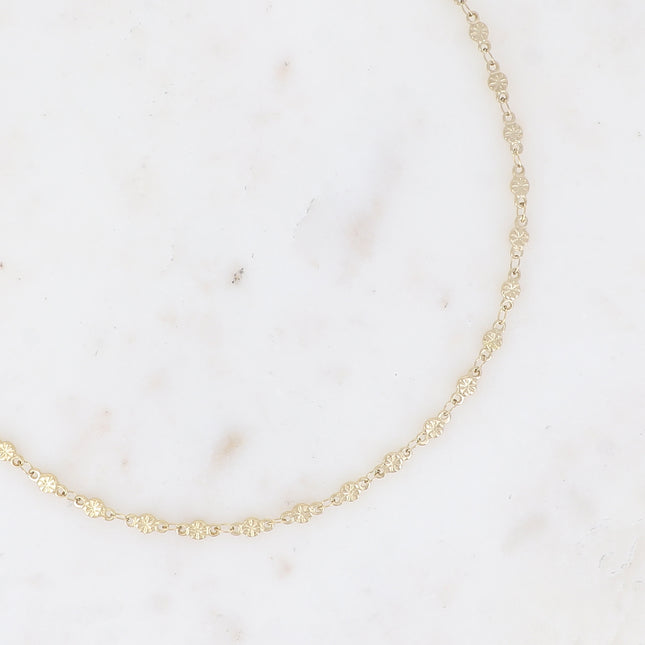 Necklace - a chain of round pieces with engraved stars