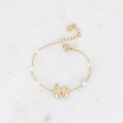 Bracelet Danica perles - noeud papillon et perles de résine blanche