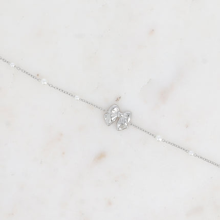 Bracelet Danica perles - noeud papillon et perles de résine blanche