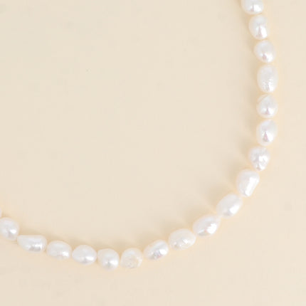Collier sur cordon - perles d'eau douce 8mm