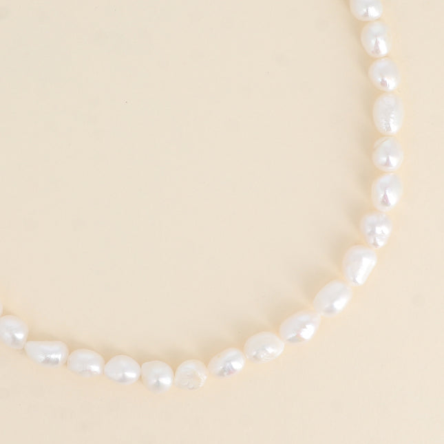 Collier sur cordon - perles d'eau douce 8mm