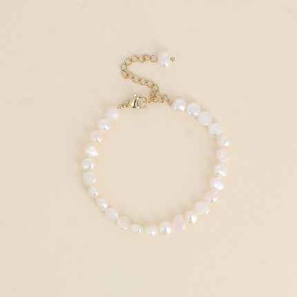 Bracelet on a cord - 6mm freshwater pearls