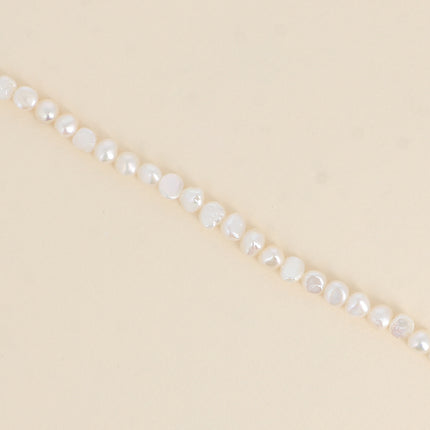 Bracelet on a cord - 6mm freshwater pearls