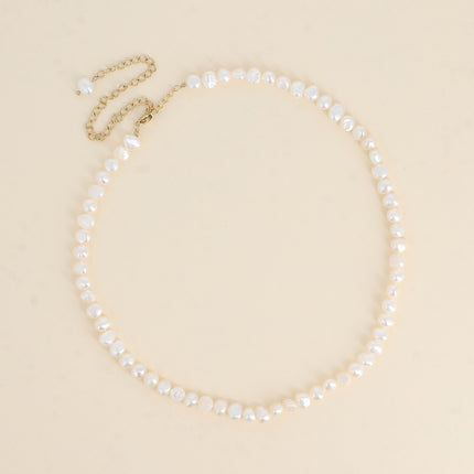 Collier sur cordon - perles d'eau douce 6mm