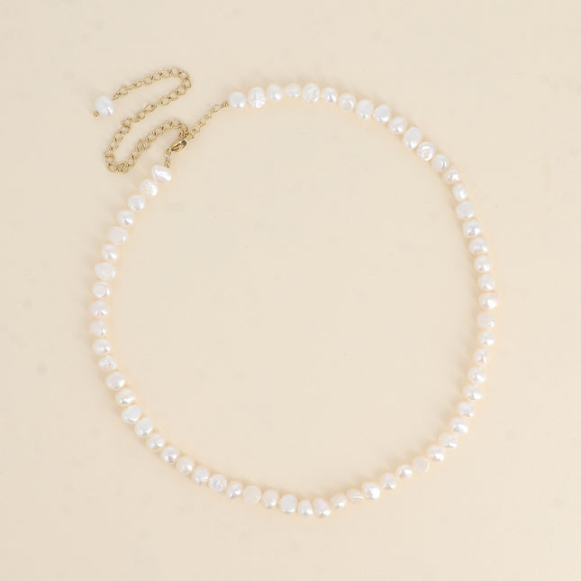 Collier sur cordon - perles d'eau douce 6mm