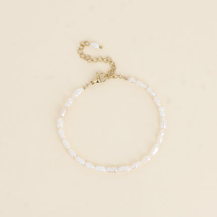 Bracelet sur cordon - perles d'eau douce allongées
