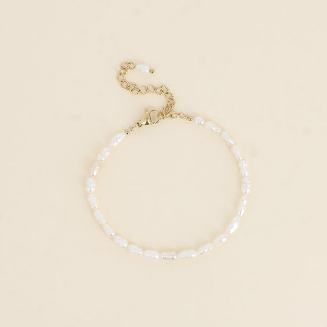 Bracelet sur cordon - perles d'eau douce allongées