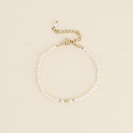 Bracelet sur cordon - perles d'eau douce 3 mm
