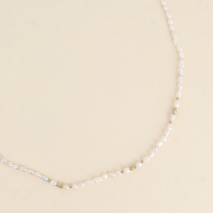 Collier sur cordon - perles d'eau douce 3 mm