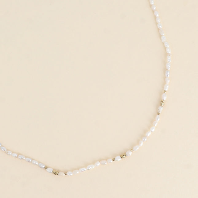 Collier sur cordon - perles d'eau douce 3 mm