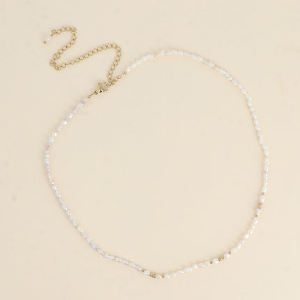 Collier sur cordon - perles d'eau douce 3 mm