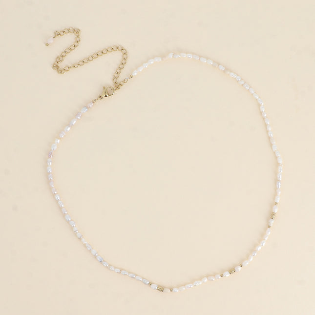 Collier sur cordon - perles d'eau douce 3 mm