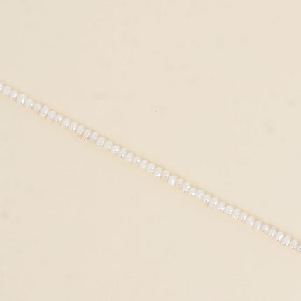 Bracelet on a cord - 3mm freshwater pearls