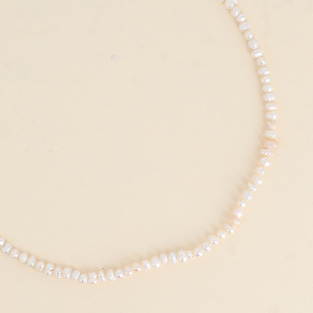 Collier sur cordon, ras de cou - perles d'eau douce 3 mm