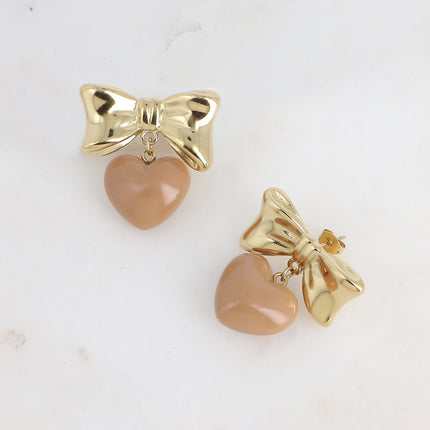 Boucles pendantes Ariadna - noeud papillon et coeur pendant en acétate