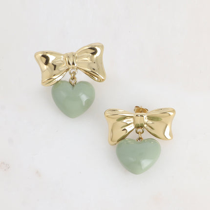 Boucles pendantes Ariadna - noeud papillon et coeur pendant en acétate