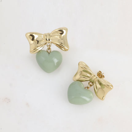 Boucles pendantes Ariadna - noeud papillon et coeur pendant en acétate