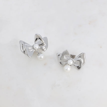 Boucles pendantes Gorgia - noeud papillon et 2 perles de résine blanche