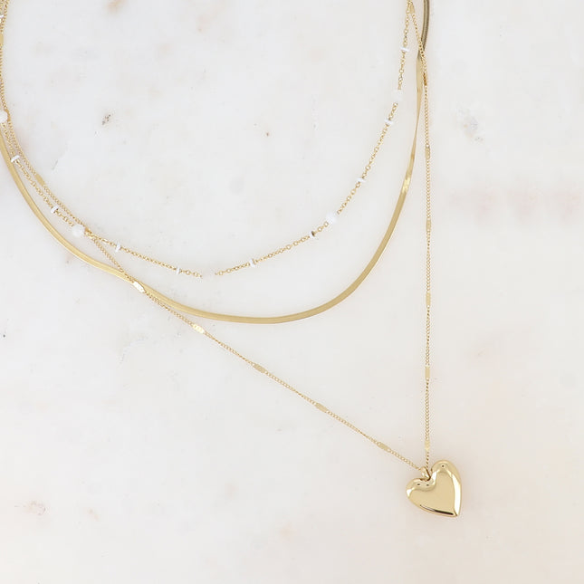 Three-strand necklace - enameled beads, natural stones, alternating mirror and curb links with a heart pendant