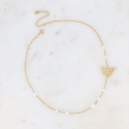 Collier Mirae - papillon texturé et perles de résine blanche