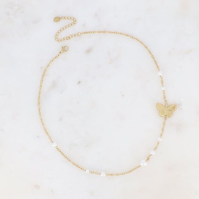 Collier Mirae - papillon texturé et perles de résine blanche