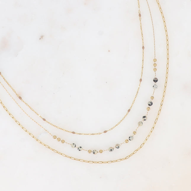 Three-strand necklace with natural stones and enamel