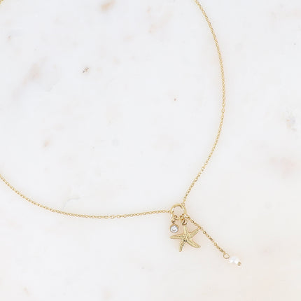 Collier Y - étoile de mer, cristal taillé, perle d'eau douce