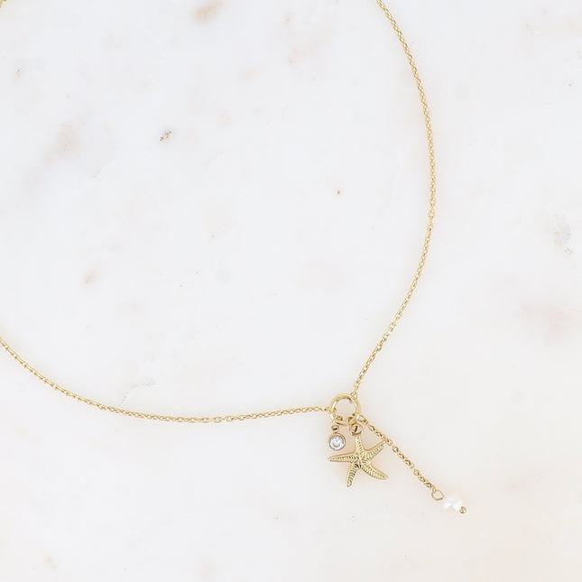 Collier Y - étoile de mer, cristal taillé, perle d'eau douce