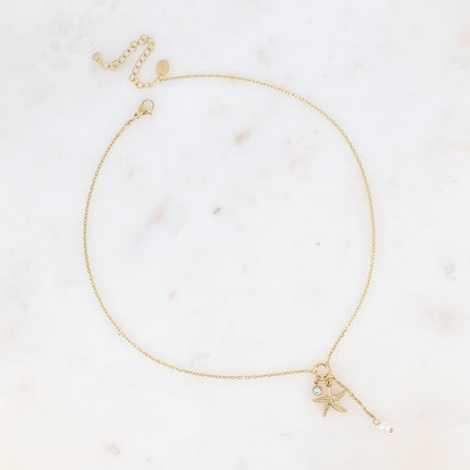 Collier Y - étoile de mer, cristal taillé, perle d'eau douce