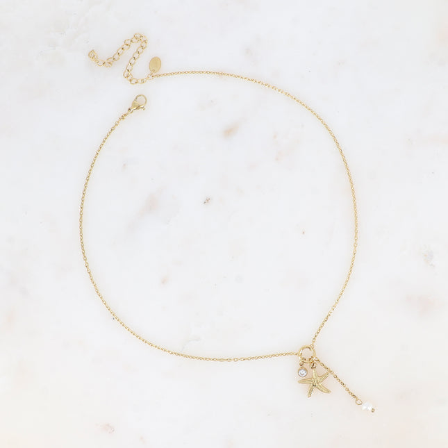 Collier Y - étoile de mer, cristal taillé, perle d'eau douce