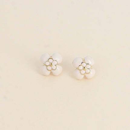 Boucles puces - motif fleur bombée en émail