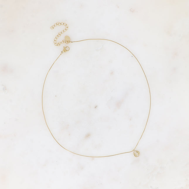 Necklace - fine snake-type chain with small cowrie shell pendant