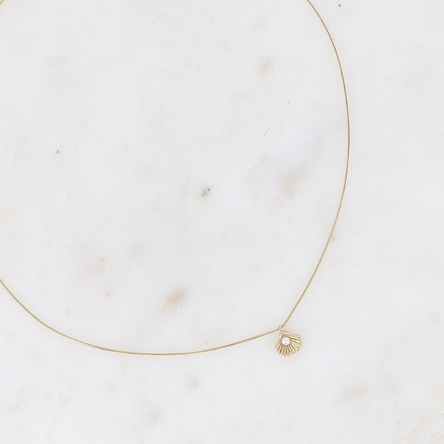 Necklace - fine snake-type chain with small seashell pendant and white resin bead
