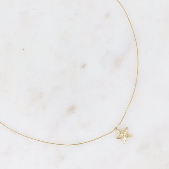 Necklace - fine snake-type chain with small starfish pendant