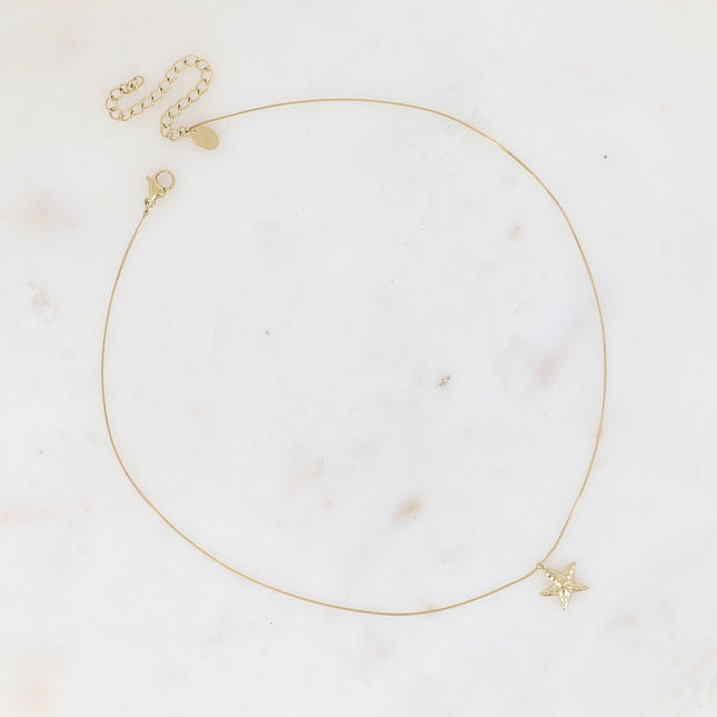 Necklace - fine snake-type chain with small starfish pendant