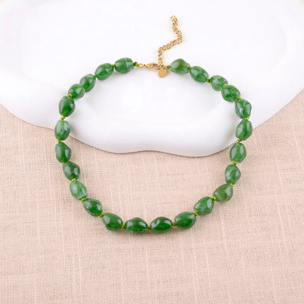 Collier sur cordon Sixtine - grosses perles en résine colorée