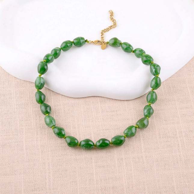 Collier sur cordon Sixtine - grosses perles en résine colorée