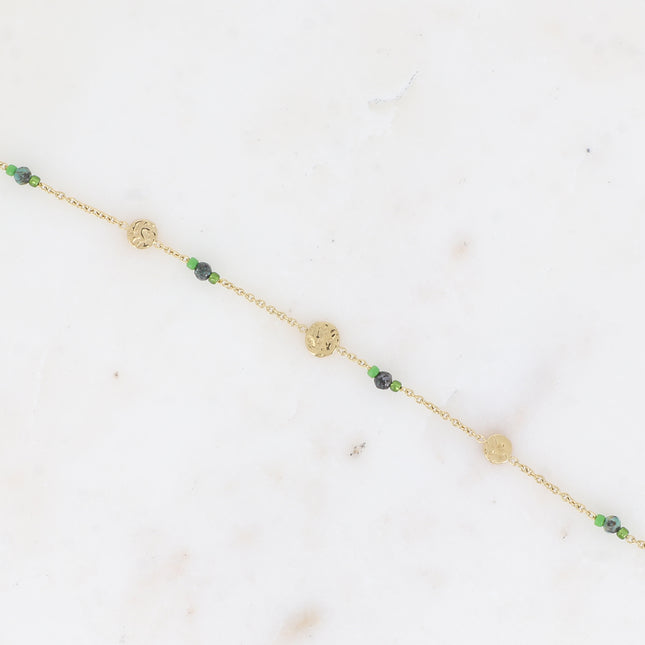 Bracelet - textured round tassels, seed beads, small natural stones