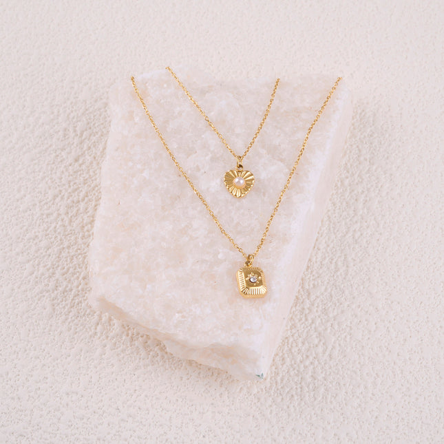 Necklace - 2 strands, heart and white resin ball, rectangular medallion, star and cubic zirconia