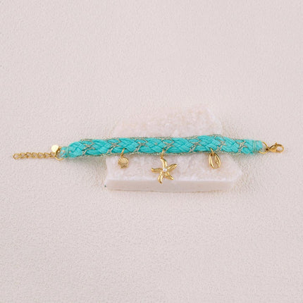 Maracya cord bracelet - buoy clasp and marine charms (seashells, starfish and cowrie shells)