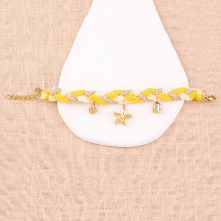 Maracya cord bracelet - buoy clasp and marine charms (seashells, starfish and cowrie shells)